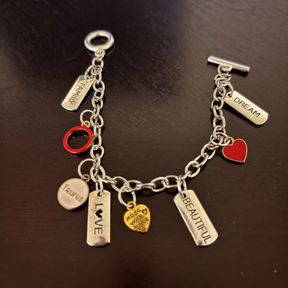 Charming Silver Bracelet with Red and Gold Accents